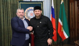 Медалью 