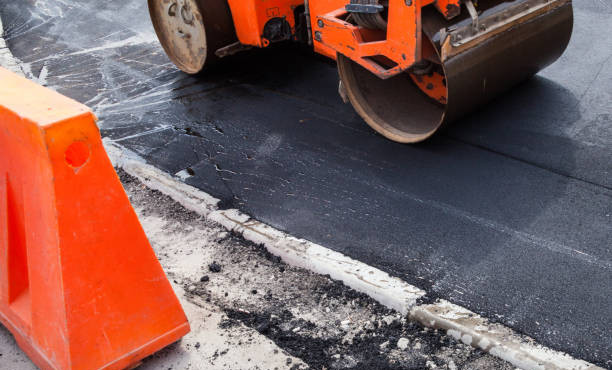 В селе Чечен-Аул подходит к концу асфальтирование улицы в рамках нацпроекта